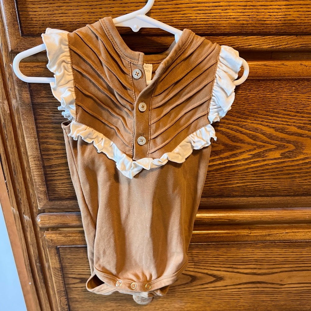 Kate Quinn Brown and White Ruffled Baby Onesie